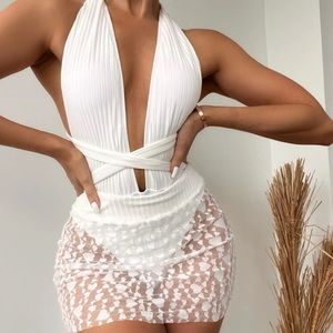Plain criss cross one piece swimsuit with beach cover up skirt